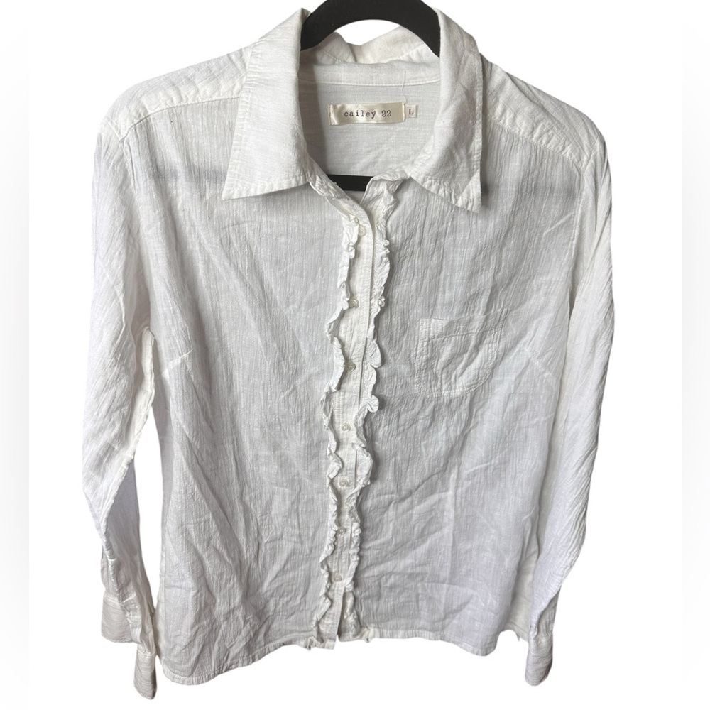 Caily22 size large white 100 % cotton ruffle front long sleeve button down.